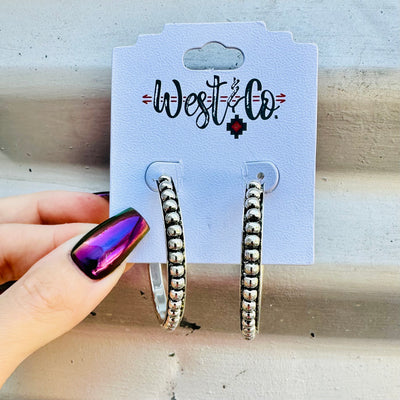 Silver spur hoop earrings