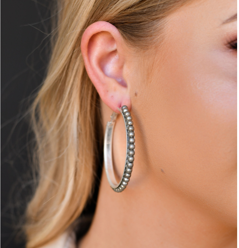 Silver spur hoop earrings